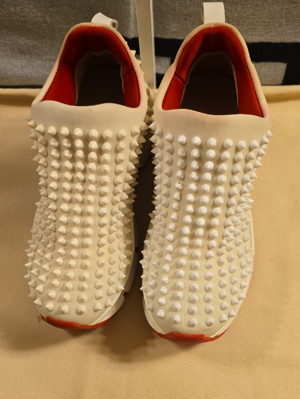 Christian Louboutin White Studded Slip-On Sneakers with Red Interior